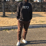 FEAR OF GOD Essentials 1977 Logo Hoodie Black FEAR OF GOD FEAR OF GOD - originalfook singapore