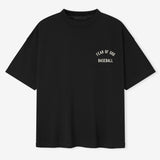 Fear of God Essentials X MLB 90s Tee, casual apparel with baseball-inspired design and logo, shown in black color.