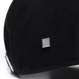 Black Wooyoungmi WYM logo cap, stylish headwear with adjustable strap and embroidered branding, casual accessory for everyday wear.