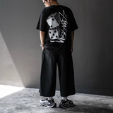 Black Stussy Tall Dice Tee shirt featuring a bold dice graphic on the front, casual streetwear style in apparel.