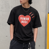 Human Made Red Heart Tee in black, casual short-sleeve t-shirt with a red heart graphic, stylish and comfortable apparel.
