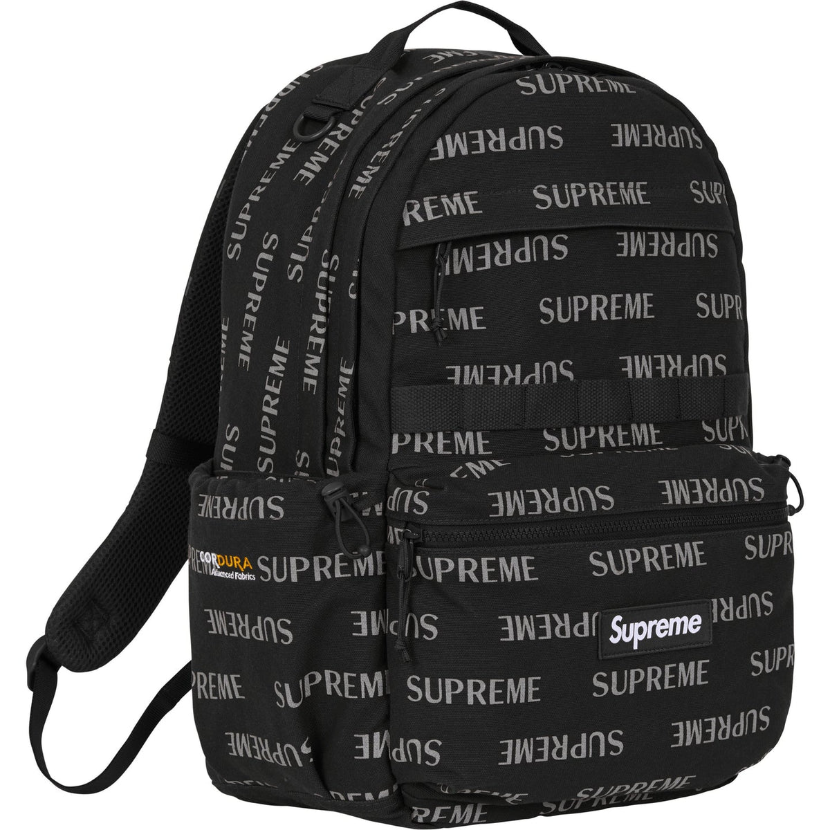 Supreme black reflective monogram logo backpack with silver logo, featuring adjustable shoulder straps and front zip pocket.