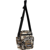 Supreme reflective monogram logo shoulder bag in predator camouflage with silver logo detail, side view showing the bag's design.