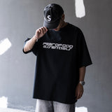 Fear of God Essentials black reflective logo 90s T-shirt, casual apparel with retro style and bold branding, front view.