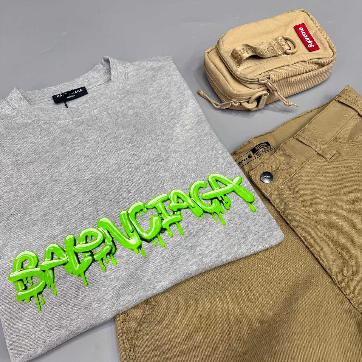 Balenciaga Slime Logo Tee in Heather, casual apparel featuring bold logo graphic on soft fabric.