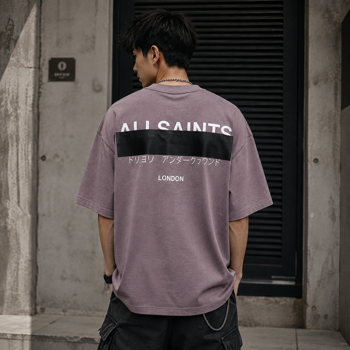AllSaints Redact Strikeout Logo Tee in puce purple with bold black logo print, casual crewneck apparel in a soft, vibrant fabric.