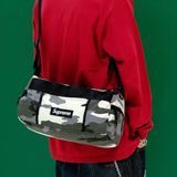 Supreme Utility Sling Bag in snow camo pattern, durable BAGS design with adjustable strap and multiple compartments.