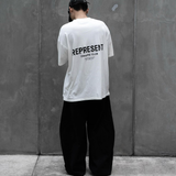 White REPRESENT Owners Club Logo Tee featuring a front printed logo design on a flat white t-shirt.