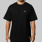 Black FR2 Sugar Donut T-shirt from the APPARELS collection, featuring a graphic design of a sugar donut on the front.