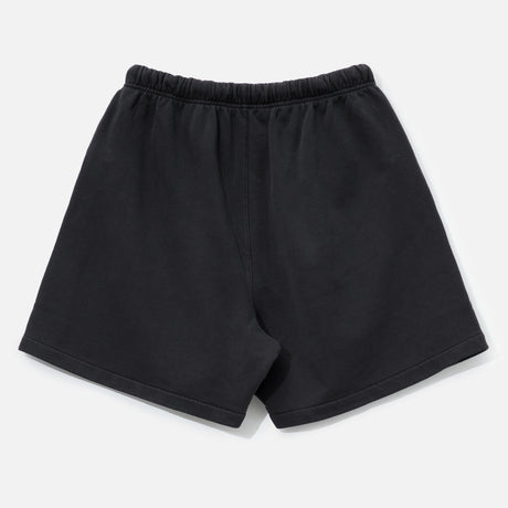 Fear of God Essentials Training 90s Shorts in faded black, casual athletic shorts with a relaxed fit and brand logo detail.