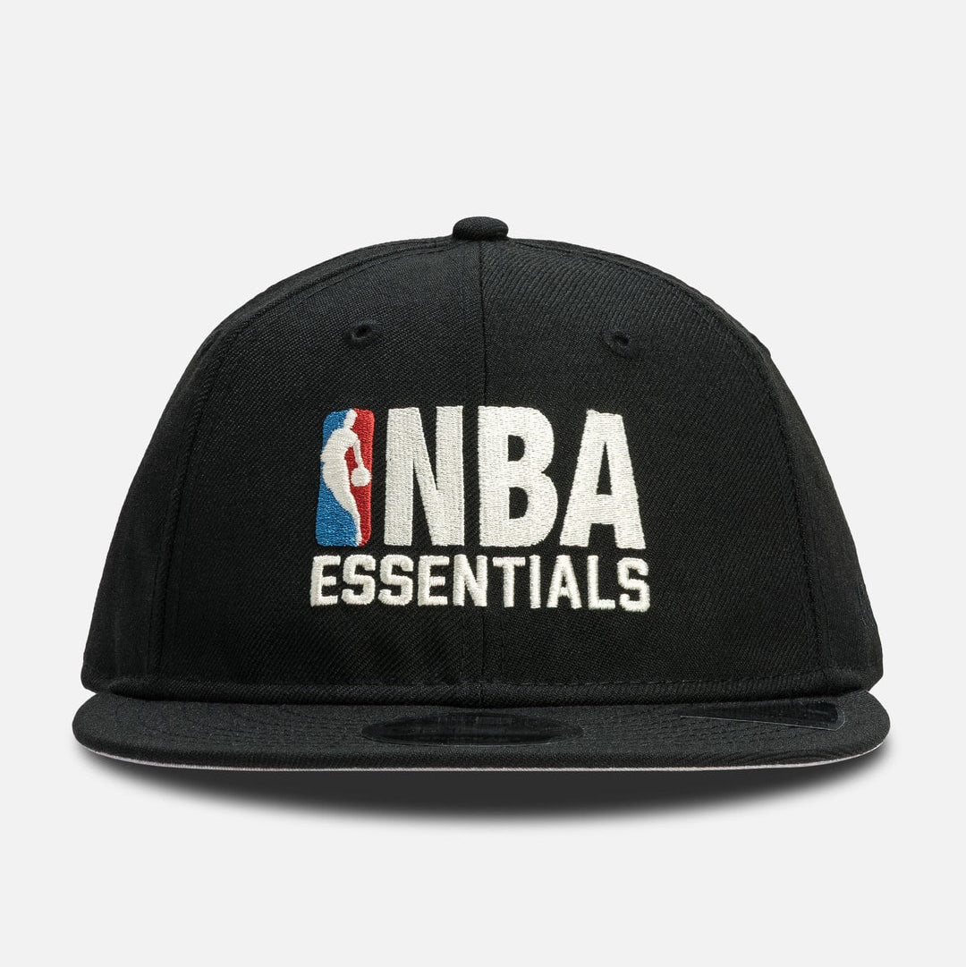 Fear of God Essentials NBA X New Era 9FIFTY cap, stylish headwear with team logo, structured fit, and iconic design.