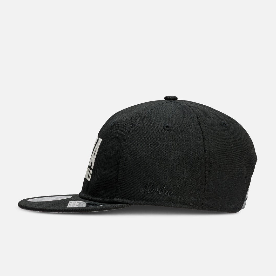 Fear of God Essentials NBA X New Era 9FIFTY cap, black headwear with team logo, adjustable snapback, stylish streetwear accessory