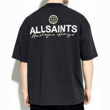 AllSaints washed black emblem logo tee, casual apparel with a printed brand emblem on the front, displayed on a hanger.