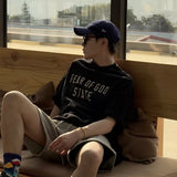 Fear of God Essentials 90's Tee Black