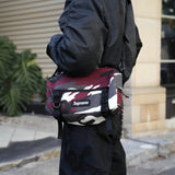 Supreme Box Logo Utility Bag in red camo with adjustable strap and zippered compartments, designed for versatile carrying.