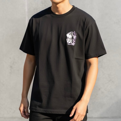 Stussy Tall Dice Tee in black, a casual black T-shirt featuring a dice graphic design, styled on a mannequin.