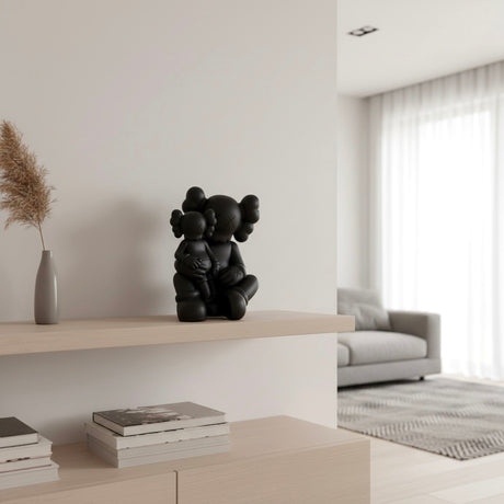 KAWS Holiday Changbai Mountain figure in black, a collectible accessory with detailed design and bold style.