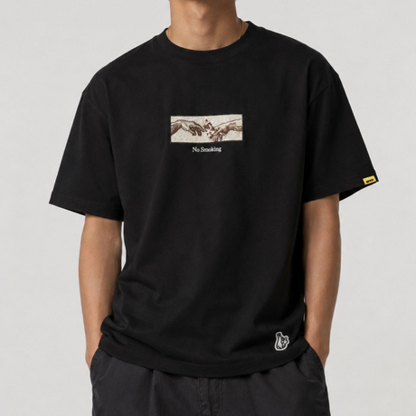 Black FR2 embroidery smoking art tee shirt featuring detailed graphic design on the front.