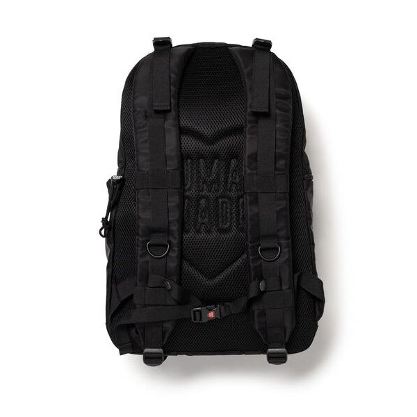 Black Human Made military backpack with multiple compartments and adjustable straps, designed for durable and functional carry.