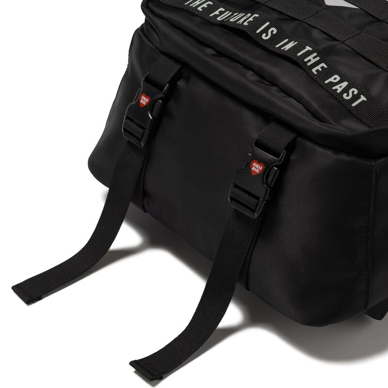 Black Human Made Military Backpack with multiple compartments and adjustable straps, designed for durability and style.