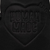 Black Human Made Military Backpack with multiple compartments and adjustable straps, designed for durable everyday use.