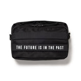 Black Human Made military sling bag with adjustable strap and multiple compartments for versatile carrying.