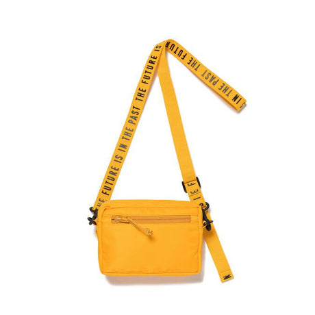 Yellow Human Made Military Mini Sling Bag with adjustable strap and compact design, perfect for casual carry.