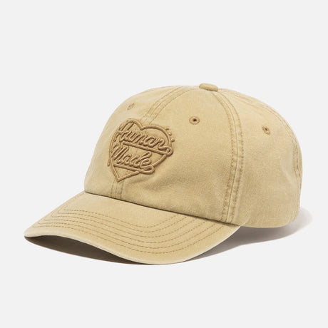 Beige Human Made Heart Logo 6-panel cap with adjustable strap, casual headwear featuring the brand's distinctive heart logo.