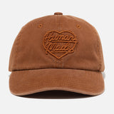 Human Made brown 6-panel cap featuring the heart logo, a stylish headwear accessory with adjustable strap and embroidered design.