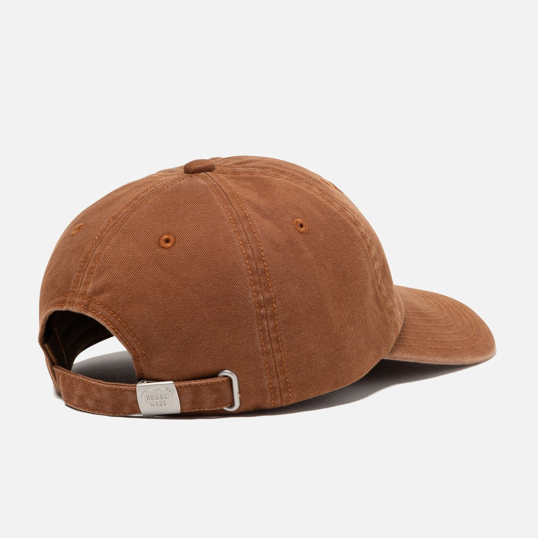 Brown Human Made Heart Logo 6-panel cap, casual headwear with adjustable strap and embroidered heart logo on front.