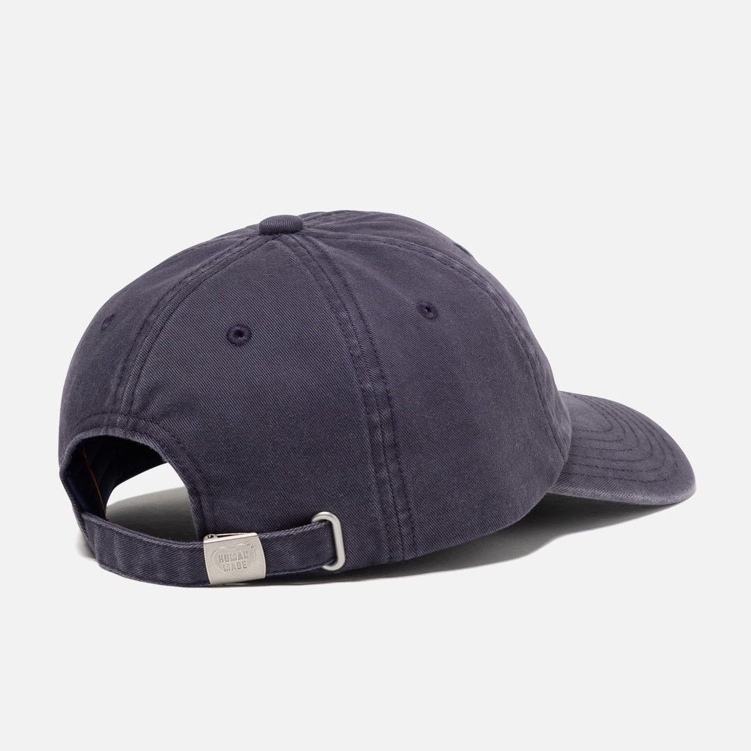 Navy Human Made Heart Logo 6-panel cap, stylish headwear with embroidered brand logo, adjustable strap, and curved brim.