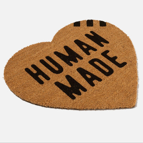 Human Made Heart Medium Rug Fiber accessory featuring a soft, textured heart-shaped design in vibrant colors.