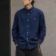 Navy Polo Ralph Lauren classic fit long sleeve shirt displayed flat, showcasing the collared design and button-up front.