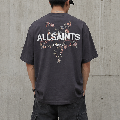 Black AllSaints Pentacle Floral Tee featuring a colorful floral and pentacle graphic on the front.