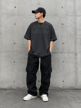 Fear of God Essentials reflective logo ponte 90s tee in upgraded fabric, featuring a classic fit and bold reflective branding.