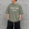 Fear of God Essentials 90's Tee Moss, casual men's t-shirt with retro style, soft fabric, and classic fit.