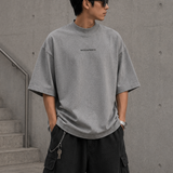 MasonPrince reflective oversized mock neck tee in dark grey, casual apparel with a relaxed fit and reflective details.