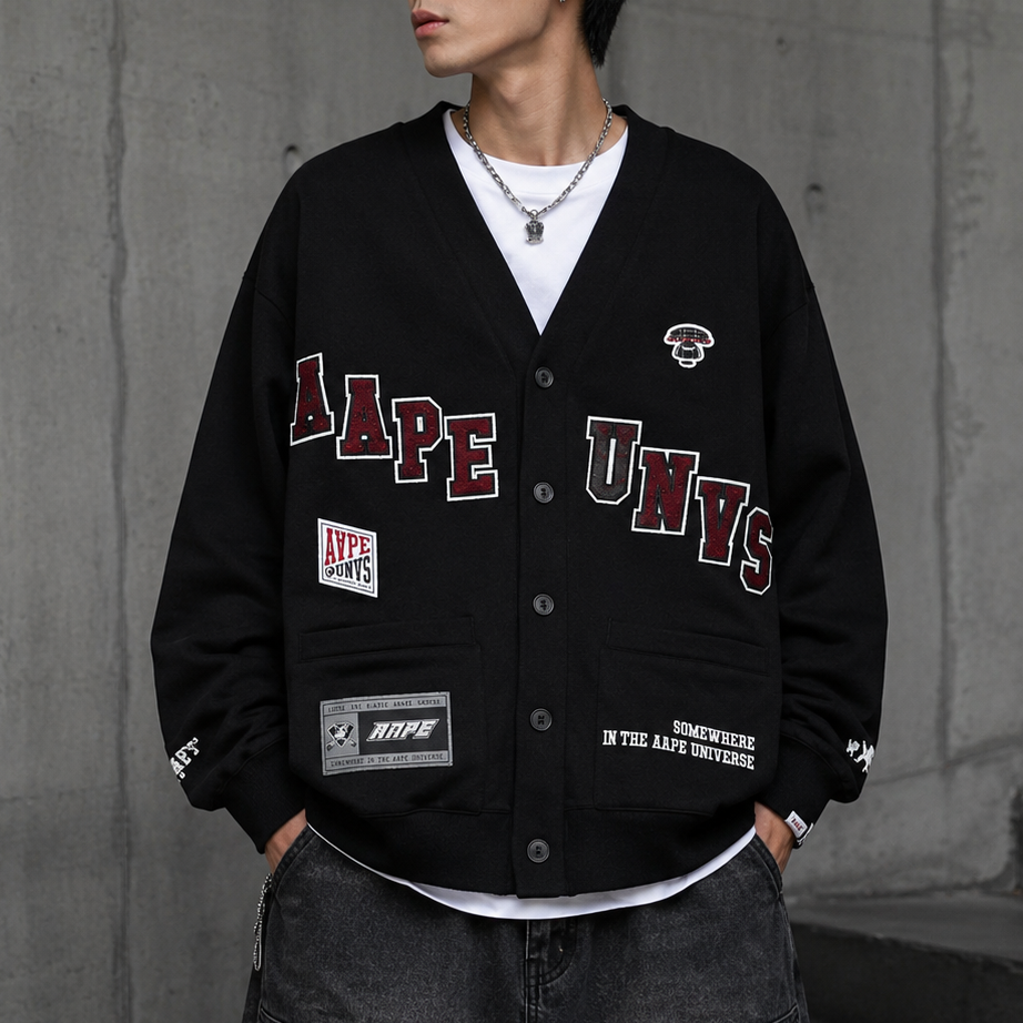 AAPE By Bathing Ape UNVS cardigan, navy blue knit sweater with logo embroidery, casual apparel for streetwear style.