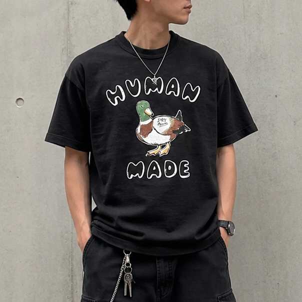 Human Made Graphic Duck Tee in black, featuring a colorful duck graphic on the front, casual apparel for streetwear style.