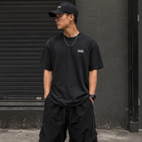 Supreme Warm Up Logo Tee in washed black, casual apparel with a bold Supreme logo on the front, perfect for streetwear style.