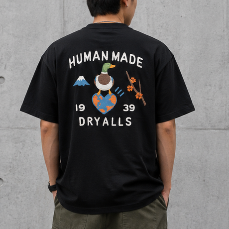 Black Human Made Japanese-Style Duck Tee featuring a graphic design on the front, casual short-sleeve apparel for streetwear.