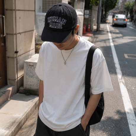 Black Human Made embroidered logo 6-panel cap featuring a structured design and adjustable strap for a stylish headwear look.