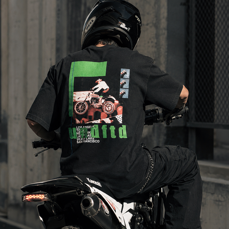 Black Undefeated Moto Tee featuring bold logo graphic, casual short-sleeve cotton T-shirt for streetwear style.