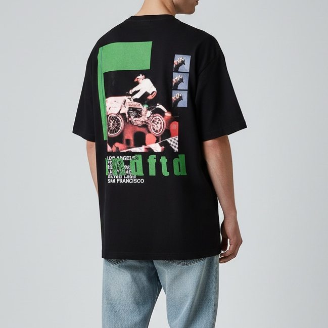 Black Undefeated Moto Tee displayed flat, showing the front with the Undefeated logo and Moto design on the chest.