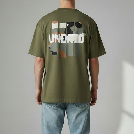 Undefeated Camo Icon Tee in olive green, featuring the brand's logo on the front, displayed on a plain background.
