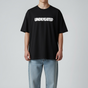 Black Undefeated Signature Logo Tee shirt, casual apparel featuring the iconic logo on the front, displayed flat.
