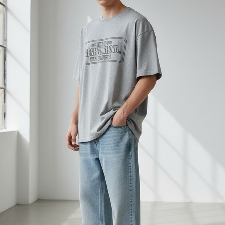 Grey Neighborhood NH-1 Tee shirt displayed on a hanger, showcasing casual streetwear style and soft cotton fabric.