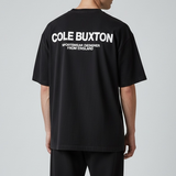 Black Cole Buxton Signature Tee, casual men's apparel with a classic fit and logo detail, displayed on a neutral background.