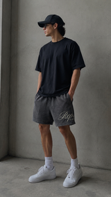 Represent Script Mesh Shorts in vintage black, showcasing lightweight fabric and stylish mesh design for casual wear.