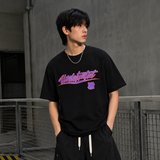Black UNDEFEATED Wrap Tee displayed flat, showing the stylish, casual design with the Undefeated logo on the front.